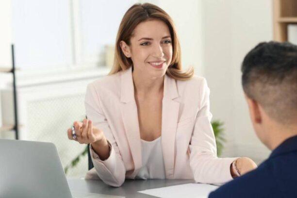 Woman interviewing a man