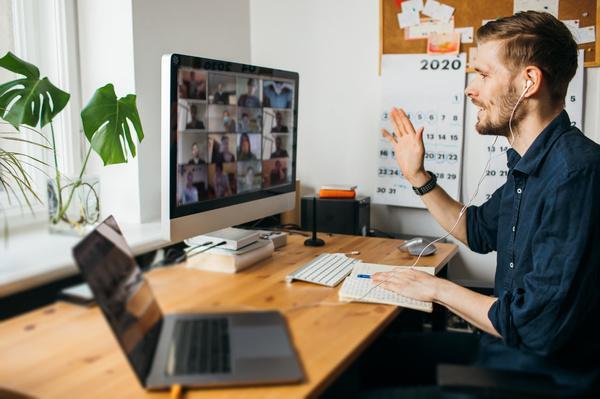 Man leading a virtual meeting