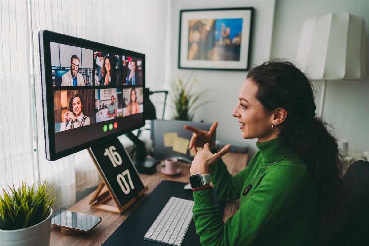 Businesspeople discussing business on virtual staff meeting during pandemic