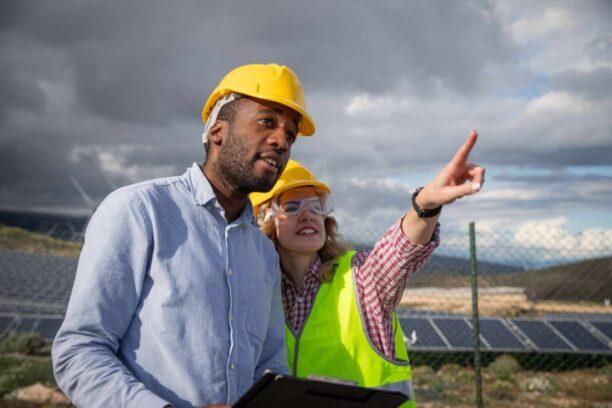 man and woman talking at a construction site