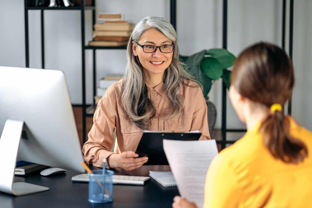 two female colleagues talking