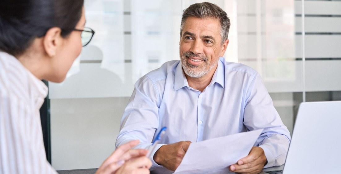 two coworkers in a meeting