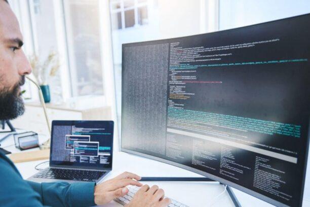 cybersecurity worker in his office