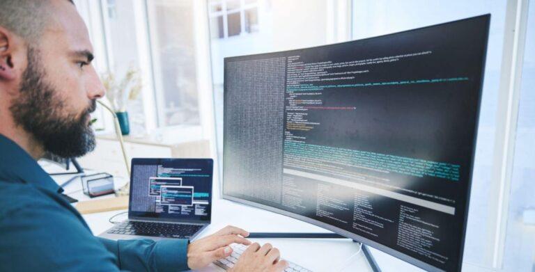 cybersecurity worker in his office